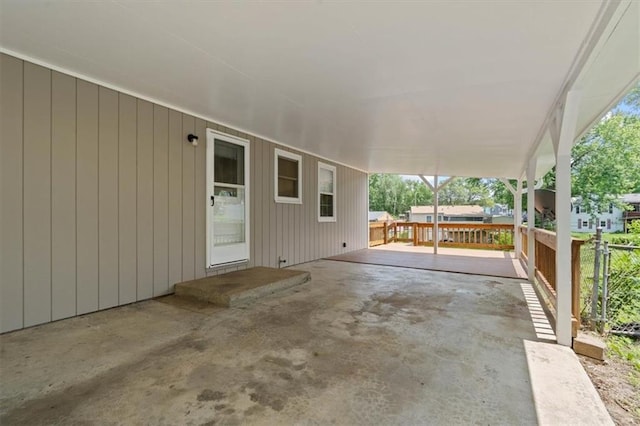 307 E 3rd Dr S, Independence, MO 64050 - view of patio featuring a carport