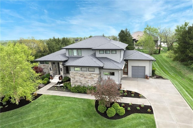 25075 W 105th Ter, Olathe, KS 66061 - view of front of property with driveway, a garage, stone siding, and a front yard
