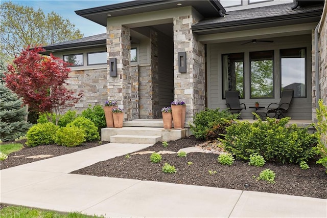 25075 W 105th Ter, Olathe, KS 66061 - doorway to property with covered porch and stone siding