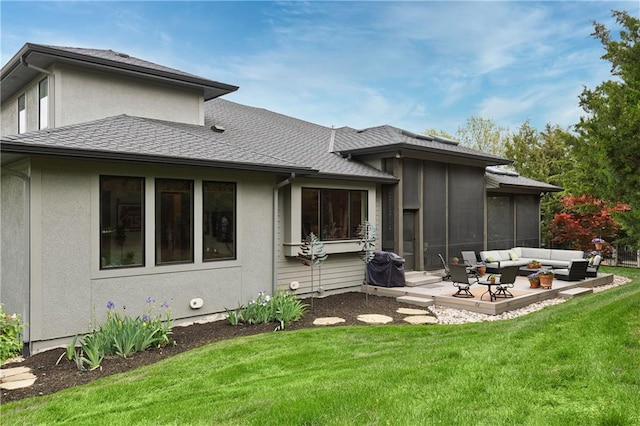 25075 W 105th Ter, Olathe, KS 66061 - back of property featuring an outdoor living space, a patio, a yard, and a sunroom