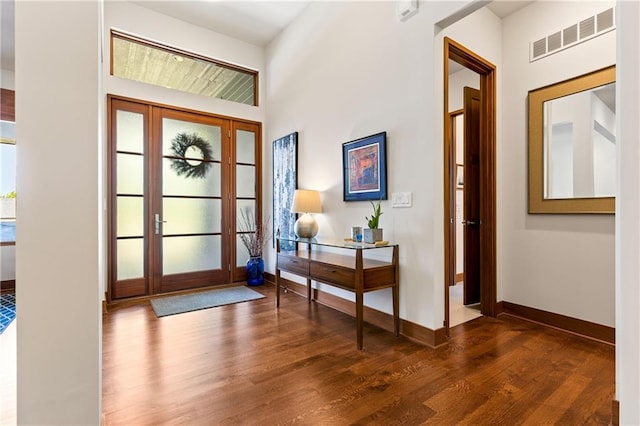 25075 W 105th Ter, Olathe, KS 66061 - entryway with dark wood-style flooring and baseboards