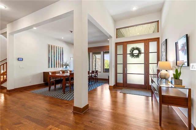 25075 W 105th Ter, Olathe, KS 66061 - entrance foyer featuring wood finished floors, stairway, and recessed lighting