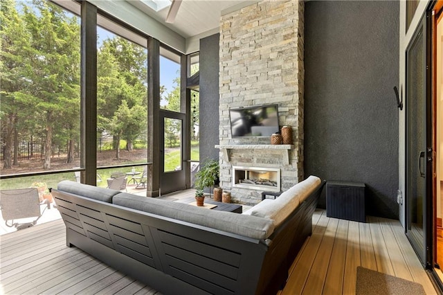 25075 W 105th Ter, Olathe, KS 66061 - sunroom / solarium with an outdoor living space with a fireplace