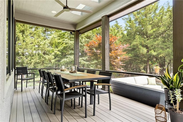 25075 W 105th Ter, Olathe, KS 66061 - sunroom / solarium with a ceiling fan, outdoor lounge area, a skylight, and outdoor dining area