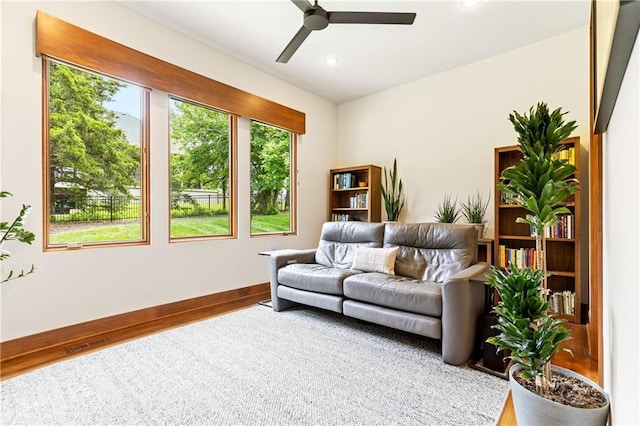 25075 W 105th Ter, Olathe, KS 66061 - living room with ceiling fan, wood finished floors, and recessed lighting