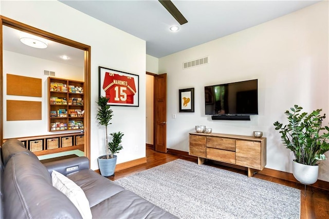 25075 W 105th Ter, Olathe, KS 66061 - living room with wood finished floors, ceiling fan, and recessed lighting