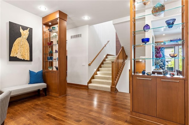 25075 W 105th Ter, Olathe, KS 66061 - foyer featuring wood finished floors, stairway, and recessed lighting