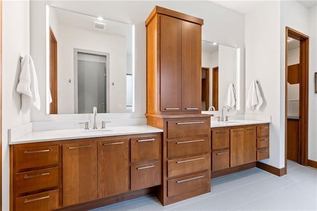 25075 W 105th Ter, Olathe, KS 66061 - full bathroom with two vanities and tile patterned floors