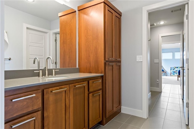 25075 W 105th Ter, Olathe, KS 66061 - bathroom with tile patterned floors, vanity, and recessed lighting