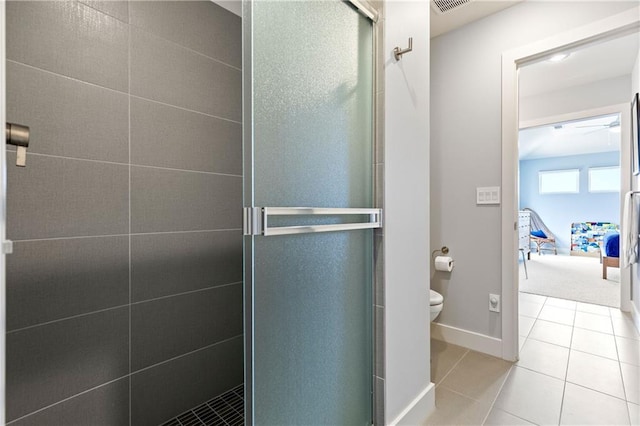 25075 W 105th Ter, Olathe, KS 66061 - bathroom with a shower stall, tile patterned floors, and a ceiling fan