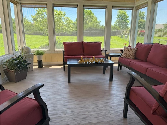 14175 W 155th St, Olathe, KS 66062 - sunroom / solarium featuring an outdoor hangout area and wood finished floors