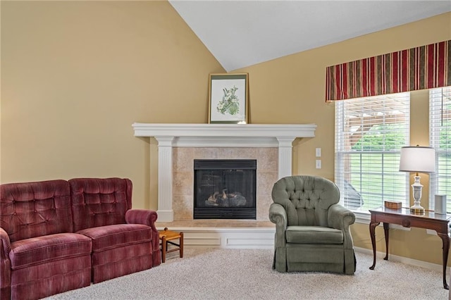14175 W 155th St, Olathe, KS 66062 - living room featuring carpet floors, vaulted ceiling, and a fireplace