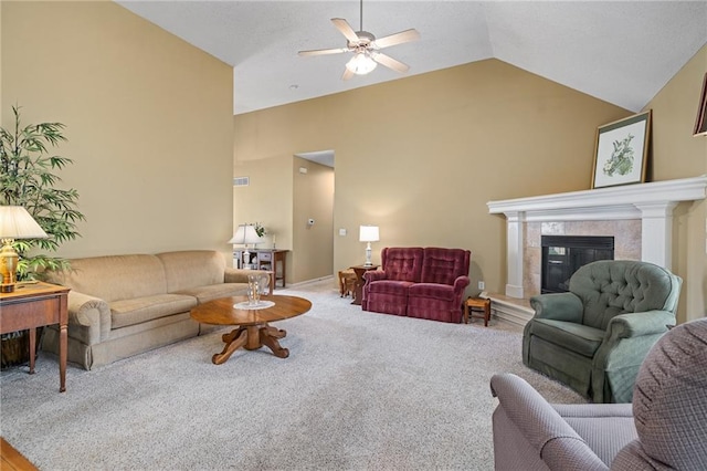 14175 W 155th St, Olathe, KS 66062 - living area featuring vaulted ceiling, a ceiling fan, carpet, and a fireplace
