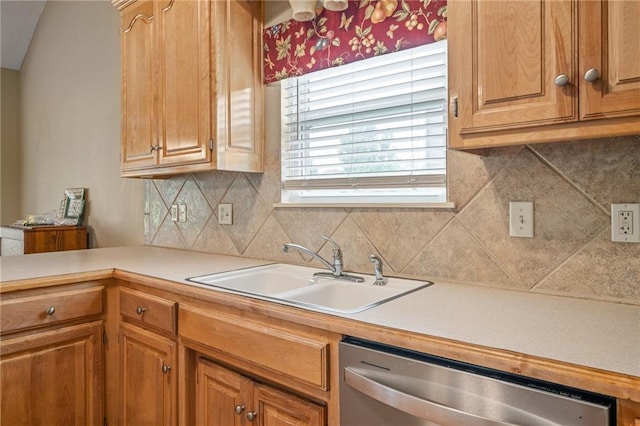 14175 W 155th St, Olathe, KS 66062 - kitchen with stainless steel dishwasher, a sink, light countertops, and backsplash