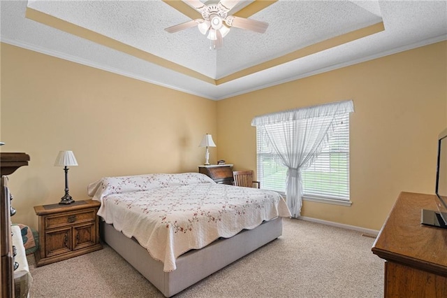 14175 W 155th St, Olathe, KS 66062 - bedroom with a tray ceiling, a textured ceiling, light carpet, baseboards, and crown molding