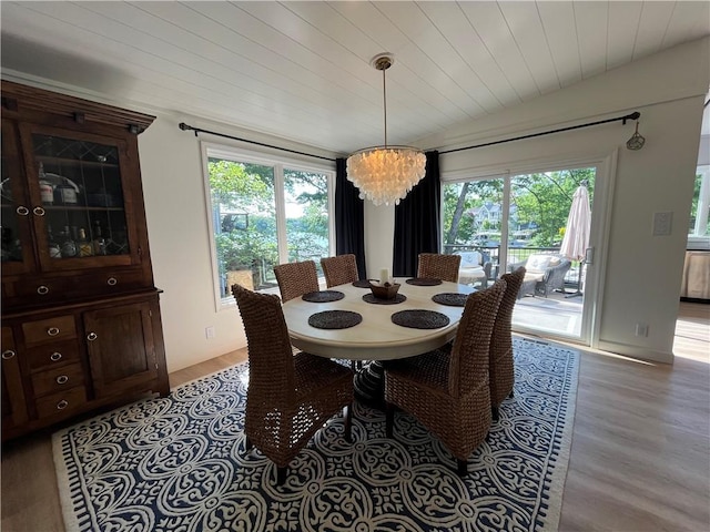 53 Z St, Lees Summit, MO 64086 - dining room with plenty of natural light, wood finished floors, a chandelier, wooden ceiling, and lofted ceiling