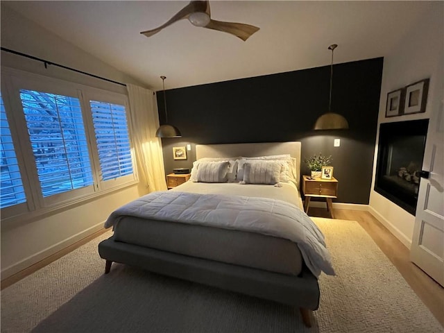53 Z St, Lees Summit, MO 64086 - bedroom with lofted ceiling, baseboards, and a ceiling fan