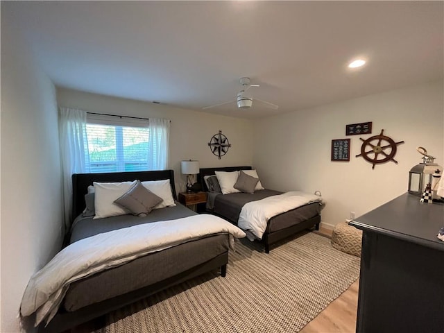 53 Z St, Lees Summit, MO 64086 - bedroom with light wood finished floors and ceiling fan