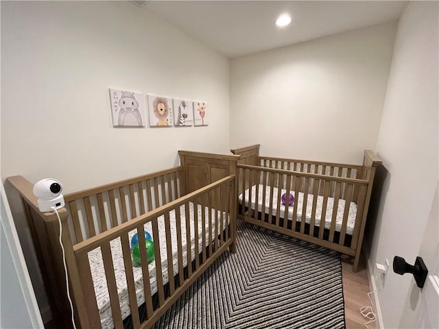53 Z St, Lees Summit, MO 64086 - bedroom featuring recessed lighting and a nursery area
