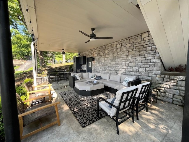 53 Z St, Lees Summit, MO 64086 - view of patio with outdoor lounge area, ceiling fan, and outdoor dining space