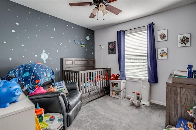 706 S Sunset Ln, Raymore, MO 64083 - carpeted bedroom with baseboards and ceiling fan