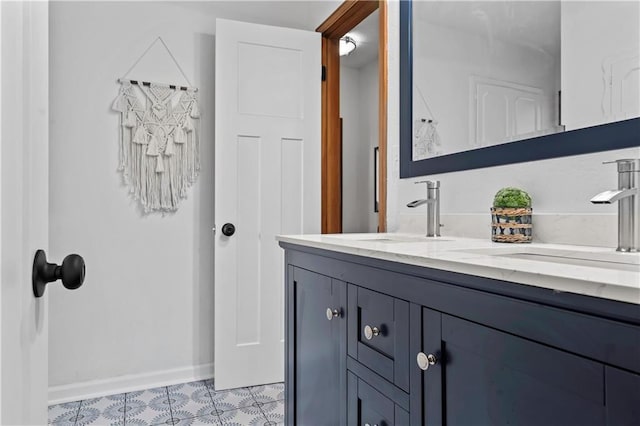 4417 E 104th St, Kansas City, MO 64137 - bathroom featuring vanity and baseboards