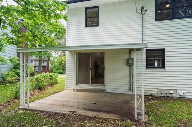 4417 E 104th St, Kansas City, MO 64137 - rear view of house with a patio