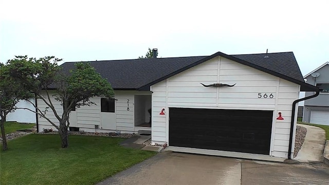566 Lake Viking Ter, Gallatin, MO 64640 - ranch-style home featuring driveway, a garage, roof with shingles, and a front lawn