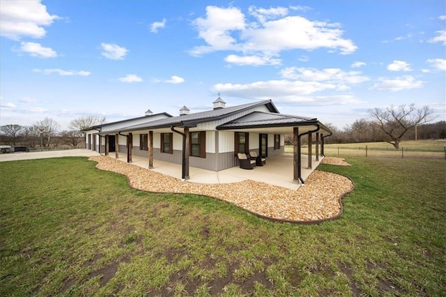 690 SW T Hwy, Holden, MO 64040 - view of property exterior with a patio area