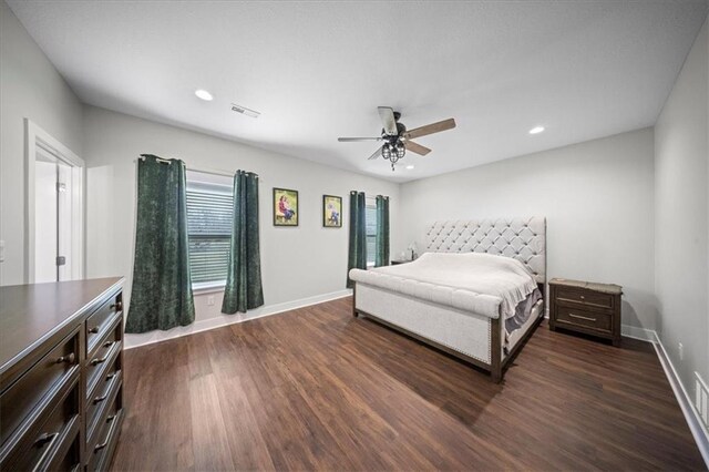 690 SW T Hwy, Holden, MO 64040 - bedroom with dark wood finished floors, baseboards, ceiling fan, and recessed lighting