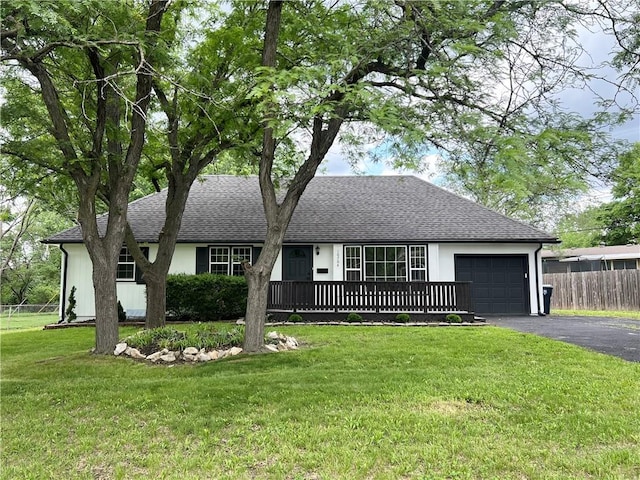 10704 Mersington Ave, Kansas City, MO 64137 - ranch-style home with a garage, driveway, and roof with shingles