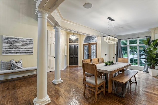 9300 W 156th Pl, Overland Park, KS 66221 - dining room featuring decorative columns, crown molding, a chandelier, hardwood / wood-style floors, and baseboards