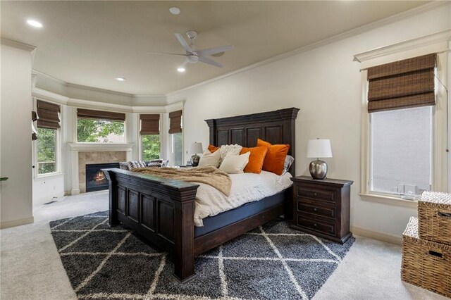 9300 W 156th Pl, Overland Park, KS 66221 - bedroom featuring carpet, baseboards, crown molding, a tiled fireplace, and recessed lighting