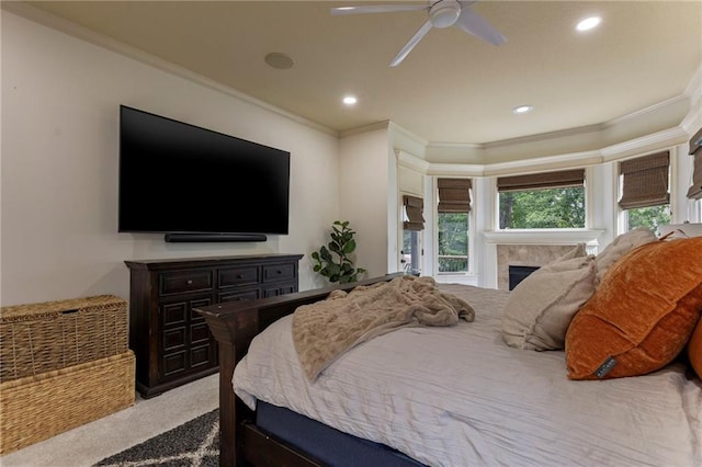 9300 W 156th Pl, Overland Park, KS 66221 - carpeted bedroom featuring ornamental molding, recessed lighting, a tile fireplace, and a ceiling fan