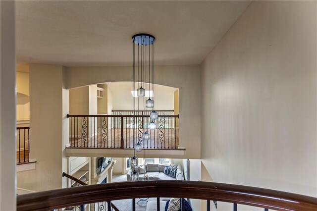 9300 W 156th Pl, Overland Park, KS 66221 - staircase featuring arched walkways