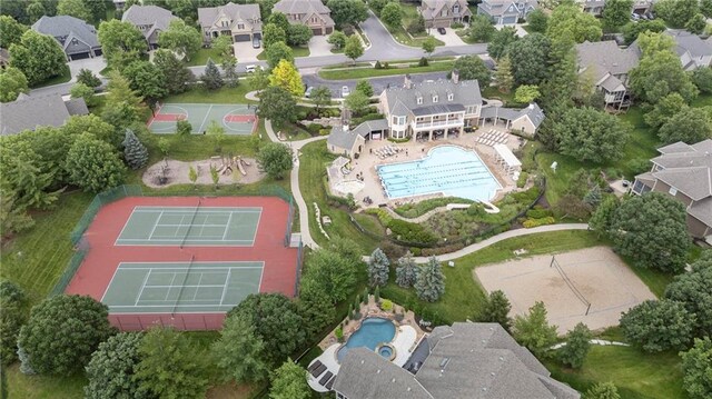 9300 W 156th Pl, Overland Park, KS 66221 - aerial view of property and surrounding area with a pool and nearby suburban area