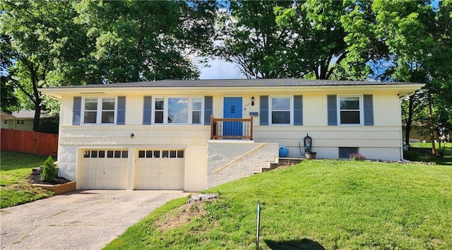 3218 NE 47th St, Kansas City, MO 64119 - single story home featuring concrete driveway and a garage