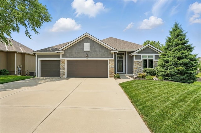 1104 NW 109th St, Kansas City, MO 64155 - craftsman inspired home featuring an attached garage, a front yard, concrete driveway, and stone siding