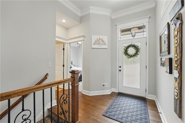 1104 NW 109th St, Kansas City, MO 64155 - entryway with wood finished floors, crown molding, and baseboards