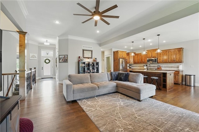 1104 NW 109th St, Kansas City, MO 64155 - living room featuring recessed lighting, ceiling fan, ornamental molding, dark wood-type flooring, and baseboards