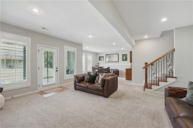 1104 NW 109th St, Kansas City, MO 64155 - living room with recessed lighting, light colored carpet, baseboards, and stairway