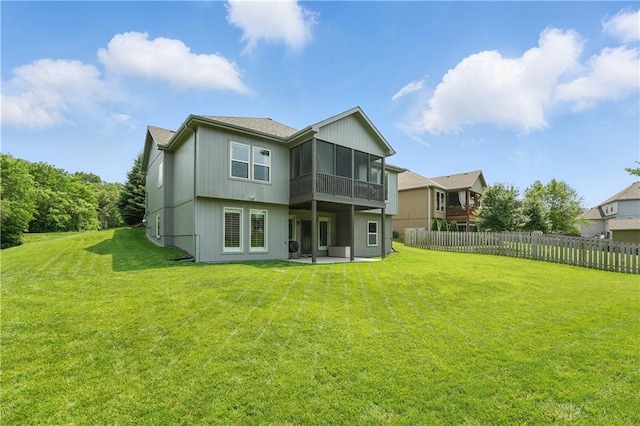 1104 NW 109th St, Kansas City, MO 64155 - back of property featuring a sunroom and a patio