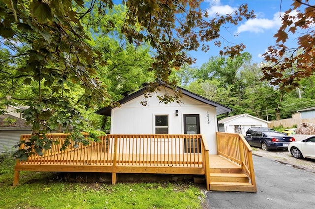 1419 Washington Blvd, Kansas City, KS 66102 - rear view of property with a wooden deck