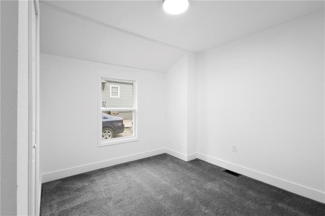 1419 Washington Blvd, Kansas City, KS 66102 - spare room with dark carpet and baseboards