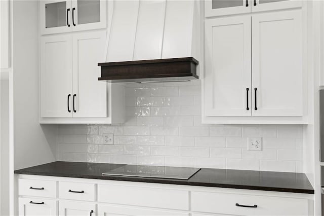14278 S Houston St, Olathe, KS 66061 - kitchen featuring white cabinetry, glass insert cabinets, and backsplash