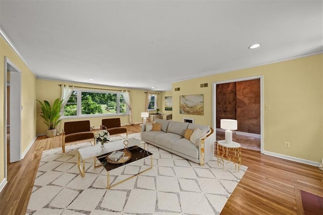 2306 Red Bridge Ter, Kansas City, MO 64131 - living area with crown molding, wood finished floors, baseboards, and recessed lighting