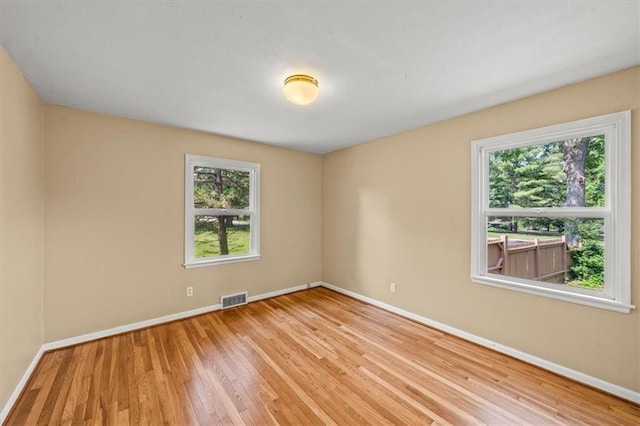 2306 Red Bridge Ter, Kansas City, MO 64131 - spare room with baseboards and wood finished floors
