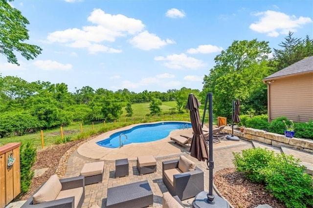 2306 Red Bridge Ter, Kansas City, MO 64131 - outdoor pool featuring a patio, an outdoor hangout area, and view of wooded area