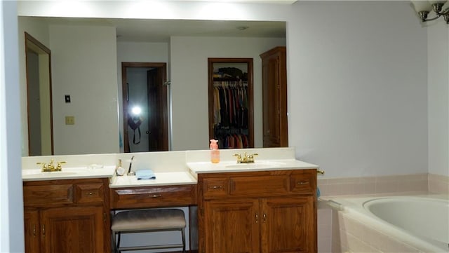 5500 NW 62nd St, Kansas City, MO 64151 - full bathroom featuring double vanity, a garden tub, and a walk in closet