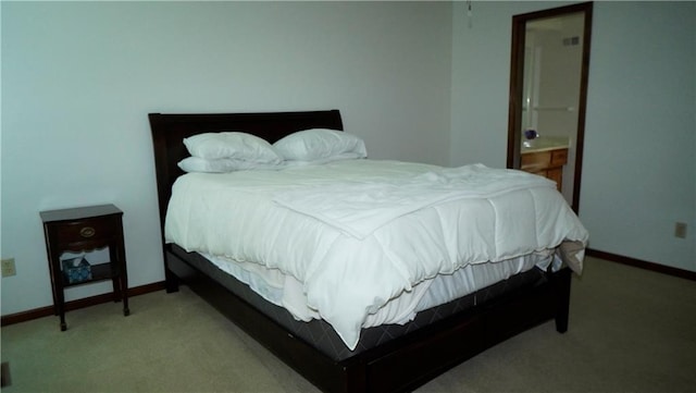 5500 NW 62nd St, Kansas City, MO 64151 - bedroom with carpet flooring, baseboards, and ensuite bathroom